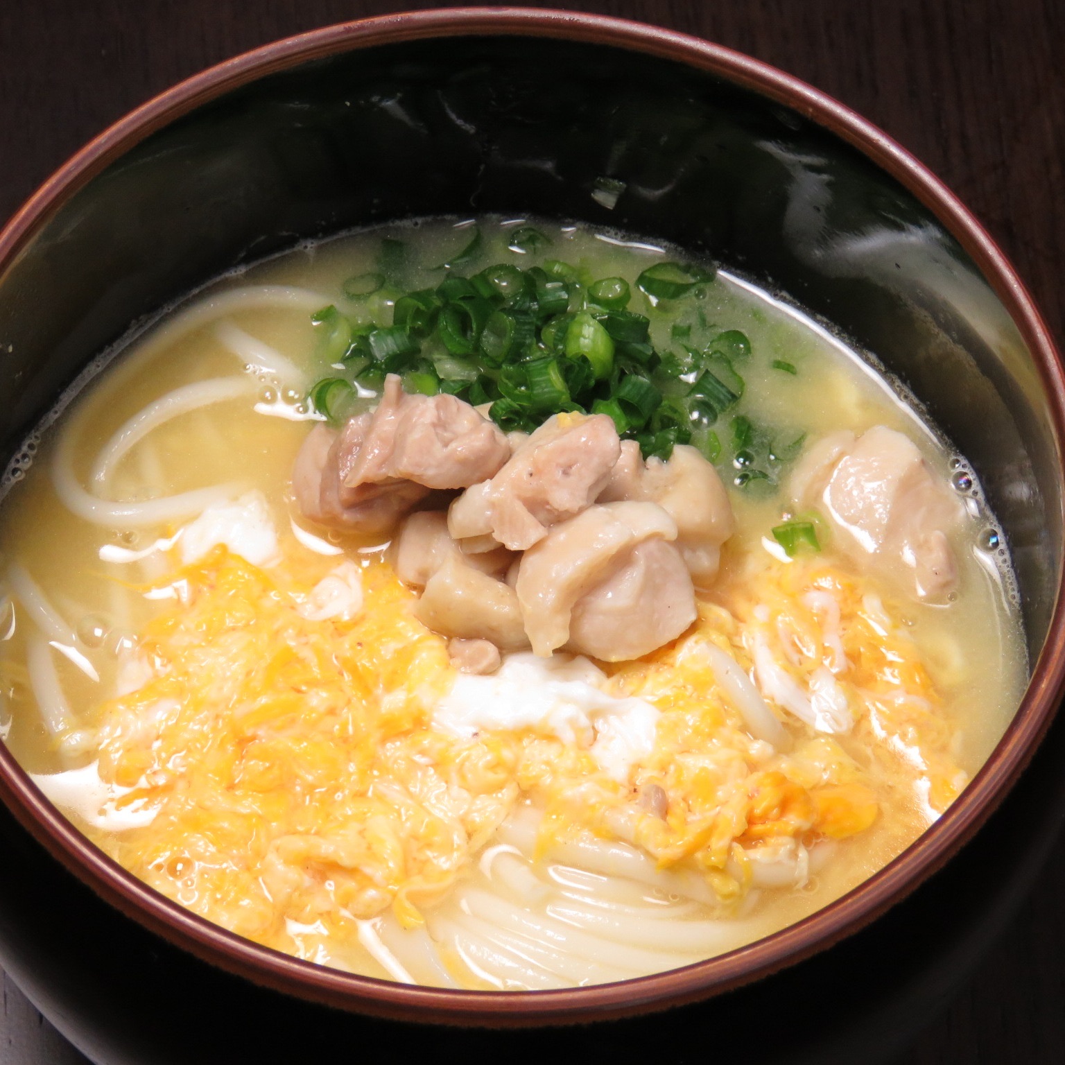 Udon Noodles Topped chicken,eggs,and onions