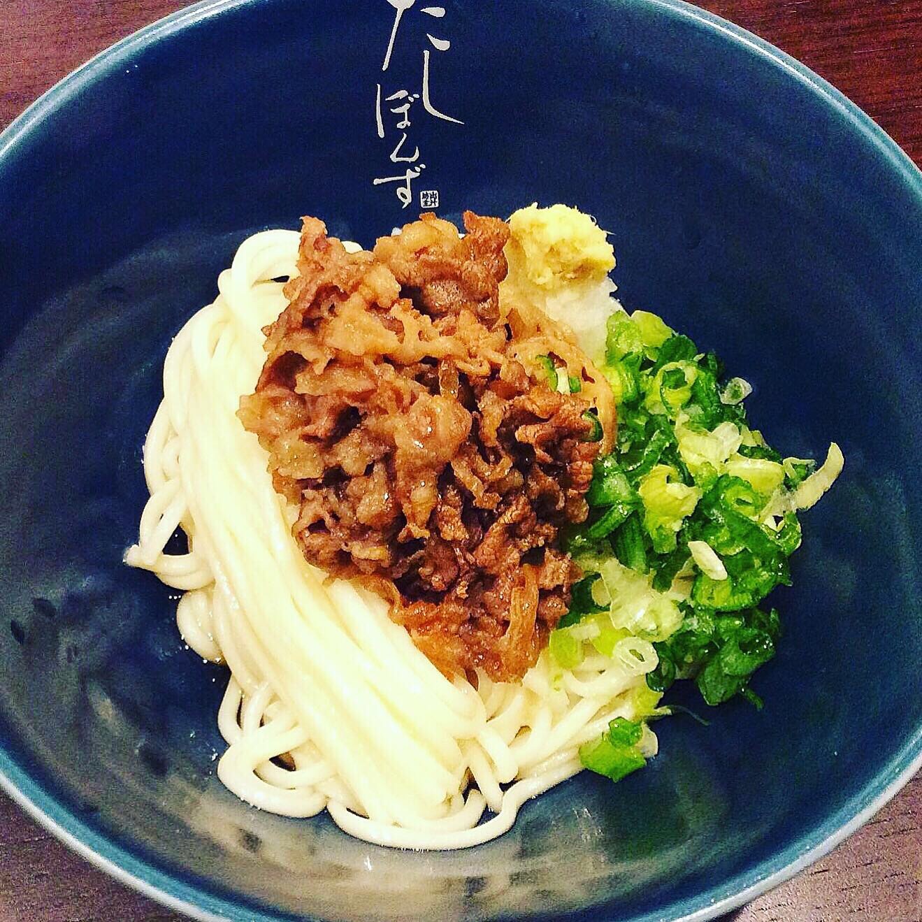 Cold Udon Noodles Topped with beef and Chilled Sauce and Other Ingredients